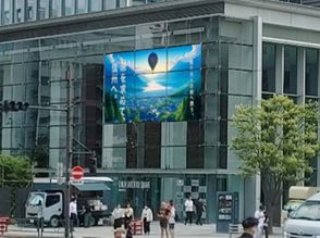 銀座のビル窓に映像が浮かび上がる--日本板硝子と松竹が透明LEDビジョンの試験放送